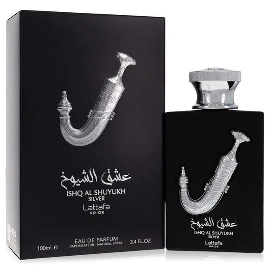 A sleek black 100ml box and bottle labeled Lattafa ISHQ AL SHUYUKH SILVER by Royal Oud Perfumes, featuring a silver dagger motif, Arabic script, metallic silver cap, and unisex fragrance.
